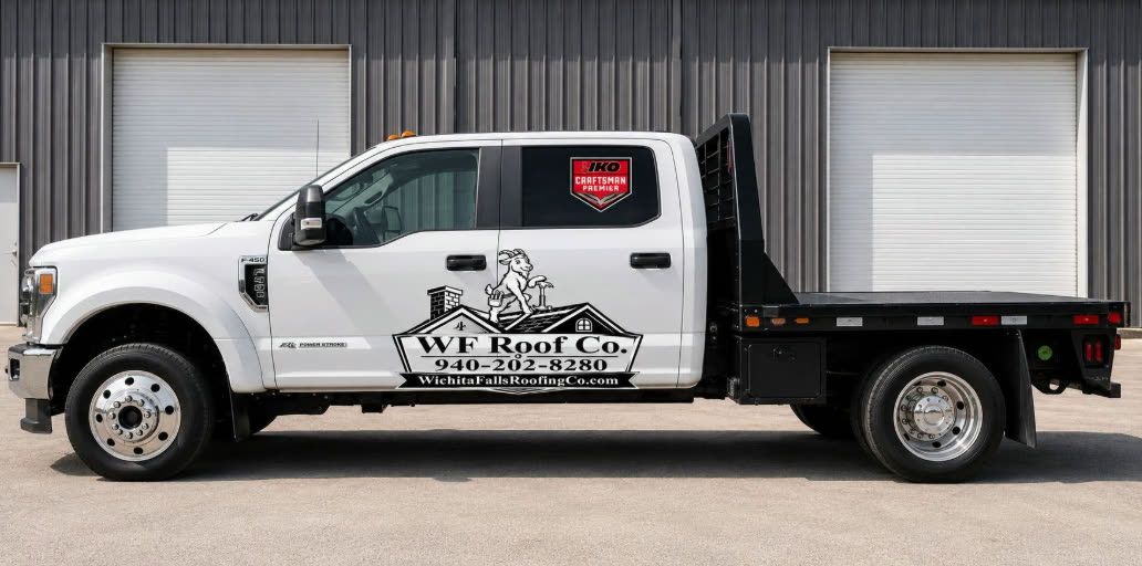 The company's white flatbed work truck